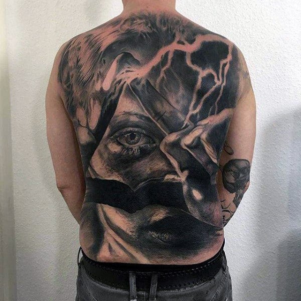 Mens Full Back Face Tattoo With Gigantic Eye And Lightening Effects
