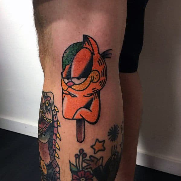 Creative Garfield tattoo as a popsicle with a smug expression and bold colors—fun and quirky design with a playful twist.