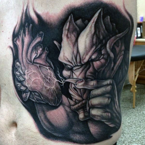 Mens Gargoyle With Heart Rib Cage Side Of Body Tattoo Ideas