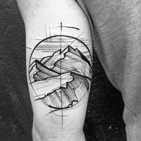 Sketch-style mountain tattoo within a circle, featuring layered peaks and dynamic linework for an artistic, hand-drawn look.