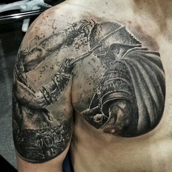 Tattoo of two fierce gladiators in battle on a person's chest and shoulder