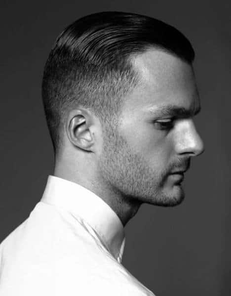 Seek, combed-back top with a high fade on the sides and back