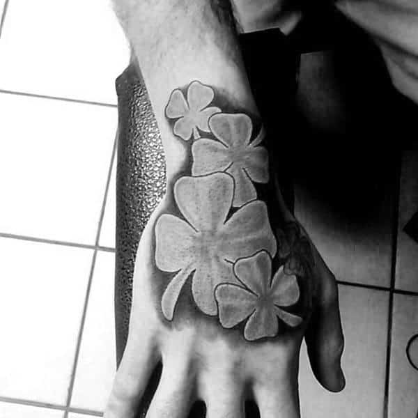 Mens Hand And Wrist Four Leaf Clovers Tattoos