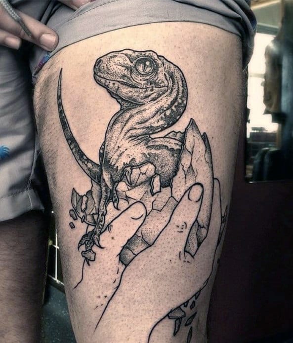 Mens Hand Holding Velociraptor Thigh Tattoos