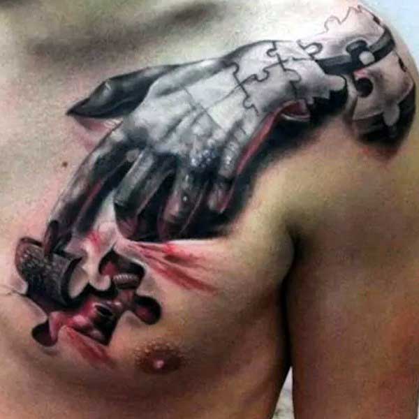 Mens Hand Puzzle Piece Tattoo On Chest With Ripped Skin