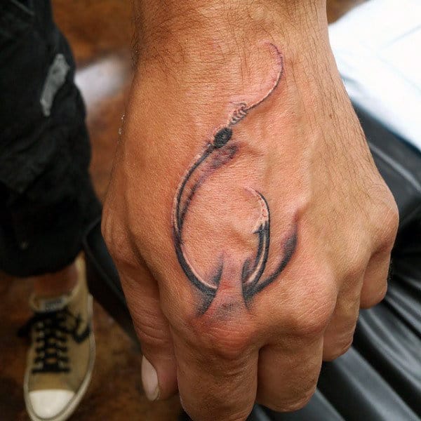Mens Hand Tattoo Of Fish Hook Through Skin Design
