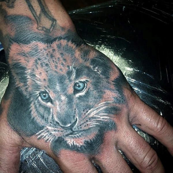 Men's Hand Young Lion Tattoos