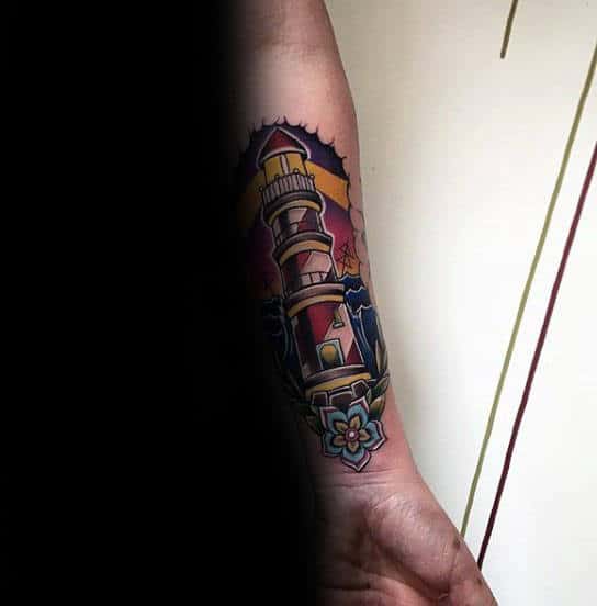 Mens Inner Forearm Tattoo Design Traditional Lighthouse With Blue Flower On Wrist