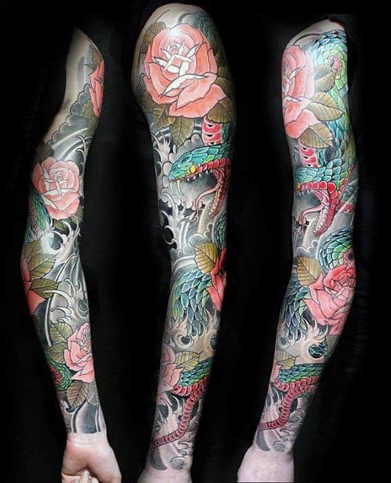 Japanese-style full-sleeve tattoo featuring a vibrant snake, pink roses, and intricate leaves with dynamic shading