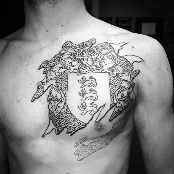 Chest tattoo of a shield with three lions, surrounded by intricate maze-like patterns and a torn skin effect, giving a bold layered appearance.