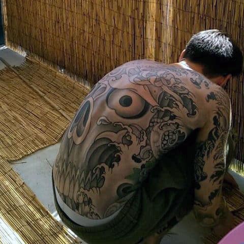 Mens Large Black Eye And Waves Tattoo Full Back