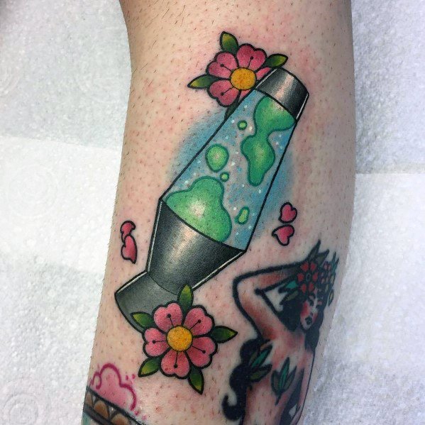 Colorful lava lamp tattoo with green wax and charming floral details, ideal for men's vibrant tattoo inspiration.