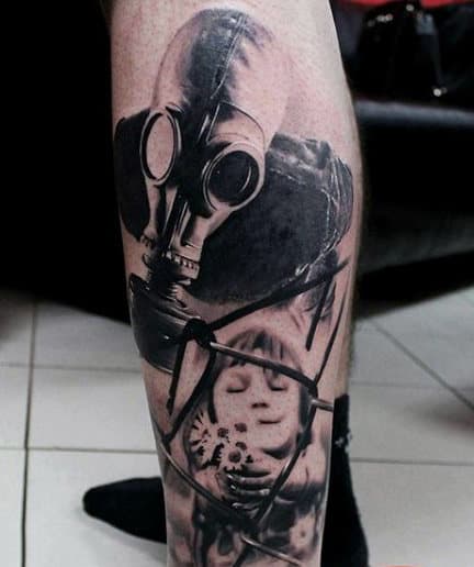 Mens Leg Tattoo Of Polish Gas Mask And Child With Flowers At The Fence