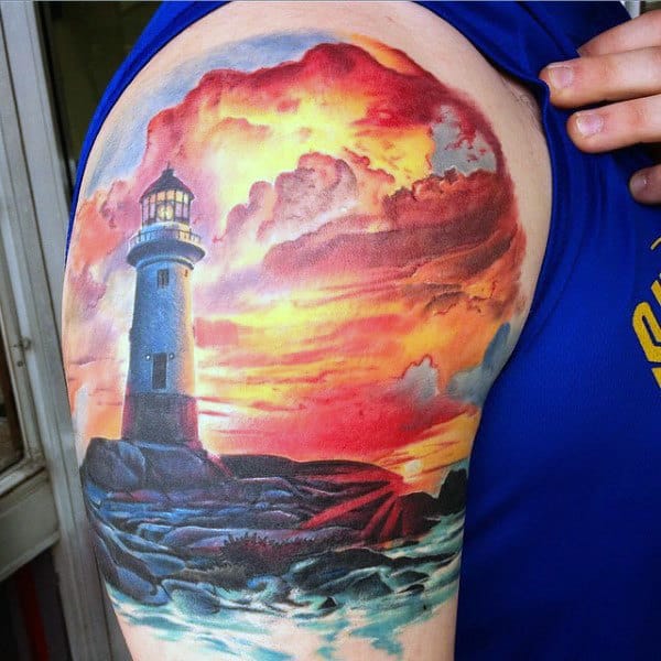 Mens Lighthouse And Ocean At Sunset Upperarm Tattoo