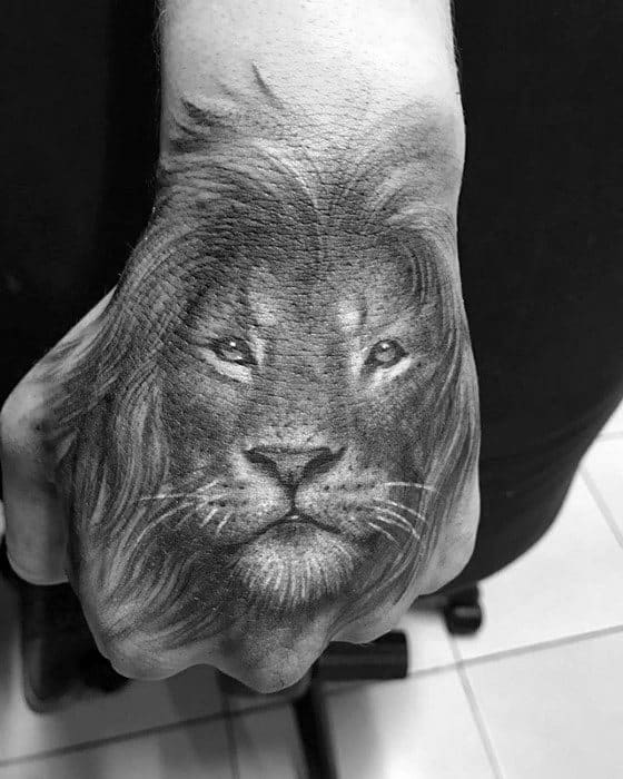 Mens Lion Hand Heavily Shaded Tattoo Ideas