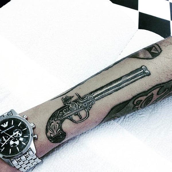 Mens Long Pistol Tattoo On Forearms