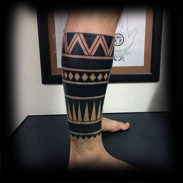 Mens Lower Leg Sleeve Tribal Negative Space Tattoo Designs
