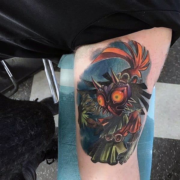 Mens Majoras Mask Tattoo Design Ideas On Thigh