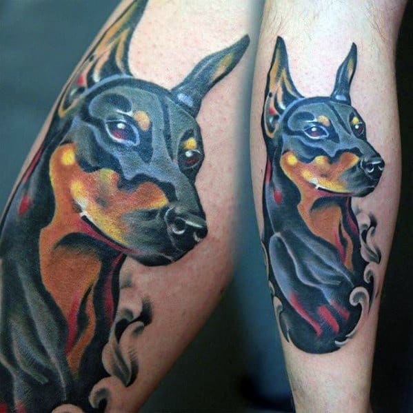 Vibrant color Doberman tattoo with glowing red and yellow accents, fluid smoke-like details, and a confident, intense gaze.