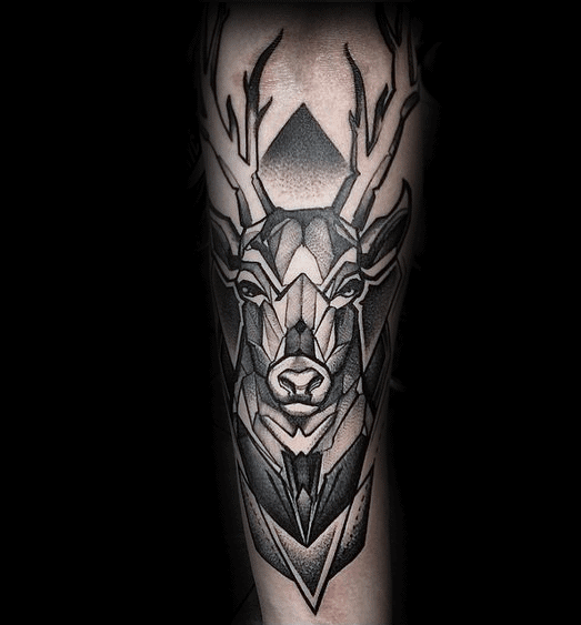 Geometric deer tattoo with sharp angular shading and symmetrical antlers, combining realism and abstract style on the forearm.