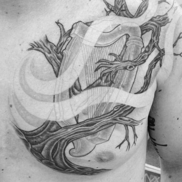 Mens Manly Harp With Tree Chest Tattoo Designs