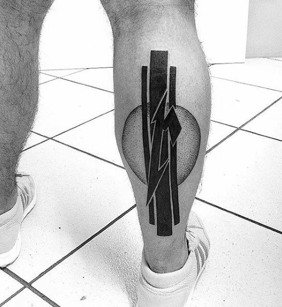 Modern geometric calf tattoo featuring the Metallica M lightning logo layered over bold black bars and a shaded circular background.
