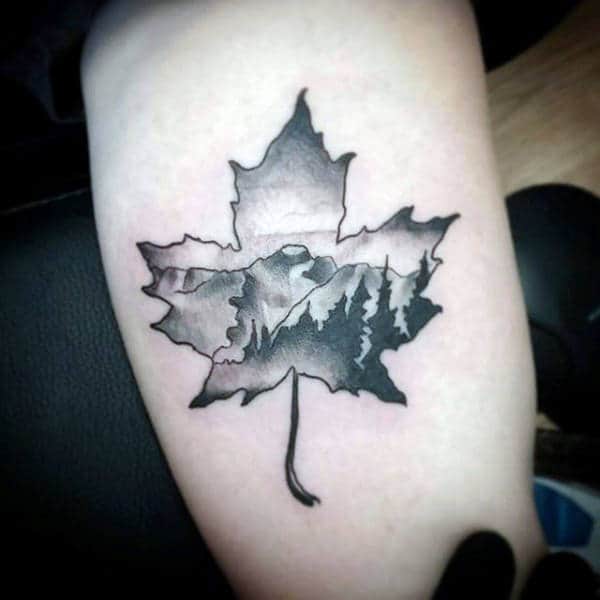 Mens Maple Leaf Tattoos With Mountain Nature Background On Arm