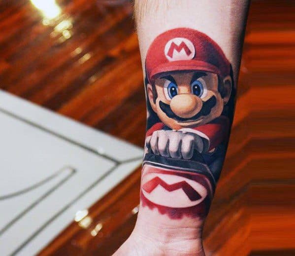 Realistic *Mario Kart* tattoo featuring Mario gripping the steering wheel, with bold shading and dynamic depth for a high-energy racing-inspired design.