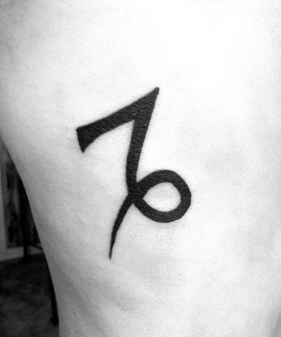 Mens Minimalist Black Ink Capricorn Symbol Rib Cage Side Tattoo