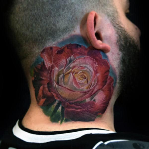 A realistic rose tattoo on the back of a man's neck