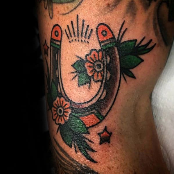 Mens Outer Arm Traditional Horseshoe Flower Tattoo
