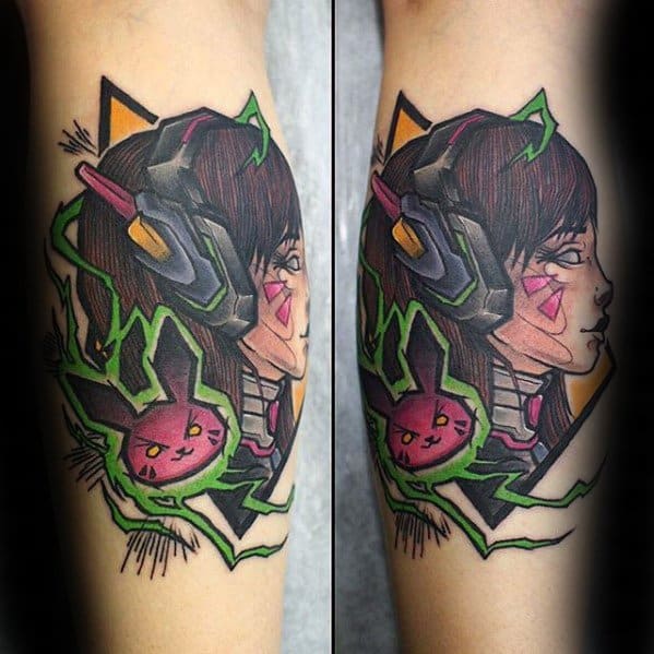 Bold and colorful tattoo of D.Va from Overwatch, featuring her mech, bunny logo, and neon green accents on a man's forearm.