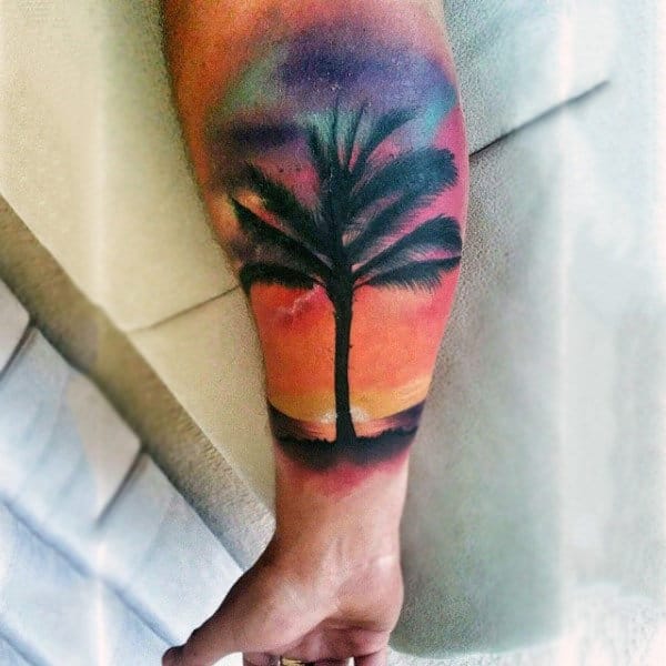Mens Palm Tree And Sunset Silhouette Tattoo On Forearm