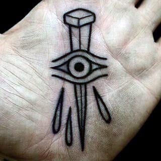 Mens Palms Nail Piercing Through Eye Tattoo
