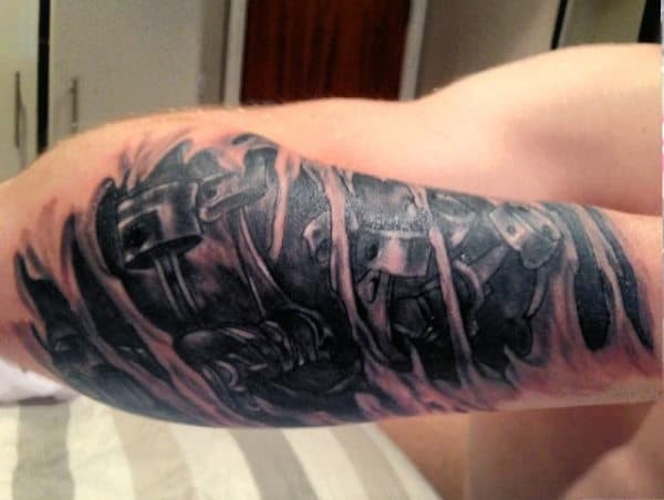 Men's Piston Tattoo On Outer Forearm