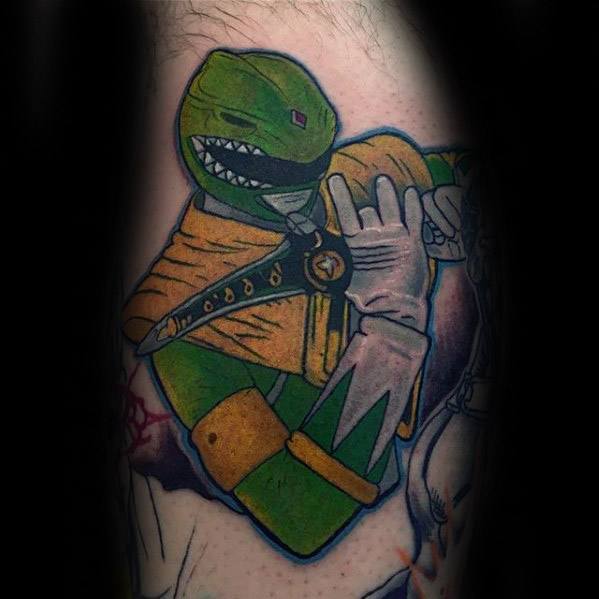 Bold Green Ranger tattoo in a classic pose with the Dragon Dagger, featuring strong outlines, vivid colors, and comic-style shading.