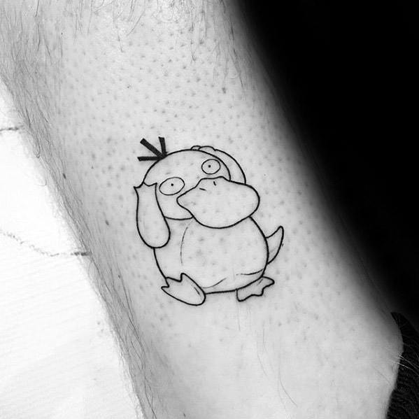 Simple black line Psyduck tattoo with a classic confused pose, placed on a man’s leg.