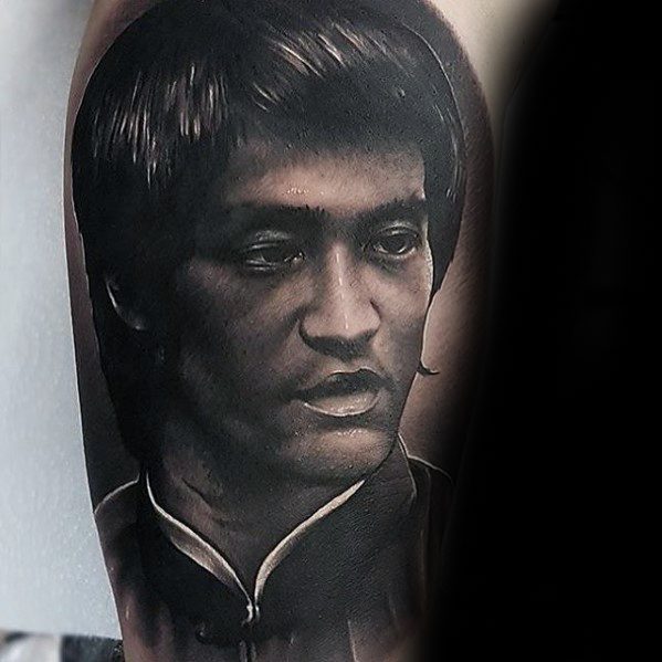 Mens Realistic Arm Portrait Tattoo With Bruce Lee Design