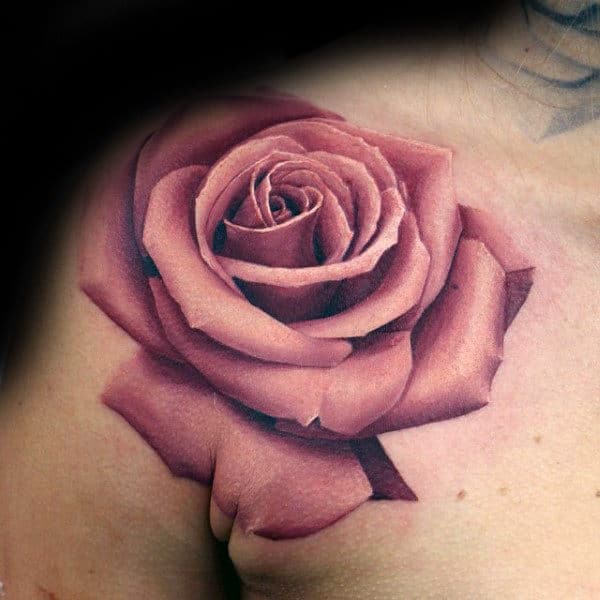 Realistic red rose tattoo on a  shoulder