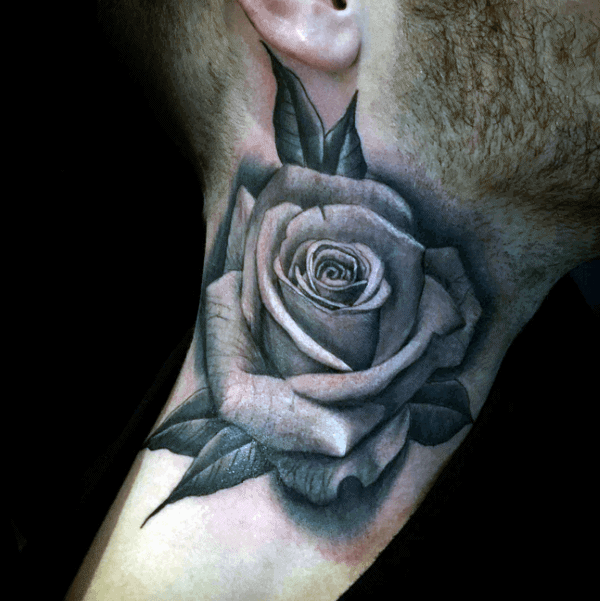 Tattoo of a detailed black and gray rose on the side of a man's neck