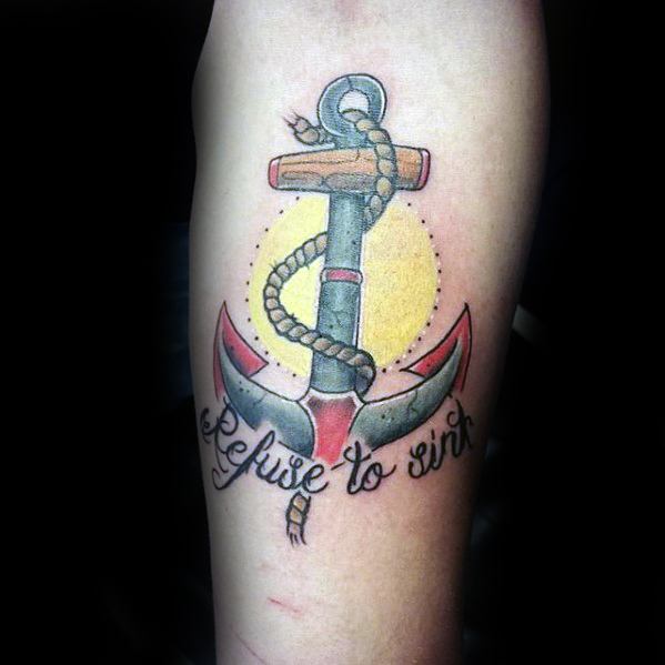 Colorful Tattoo on a forearm: an anchor with "Refuse To Sink" inked boldly