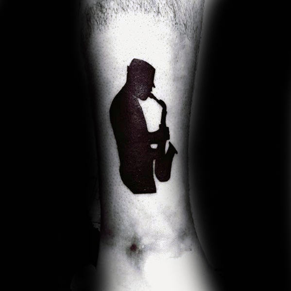 Mens Saxophone Player Silhouette Lower Leg Tattoo
