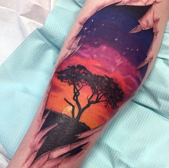 Mens Shin Tattoo African Plains At Sunset Colorful Sky