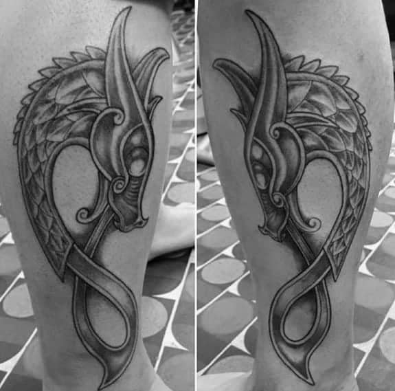 Celtic dragon tattoo on a leg