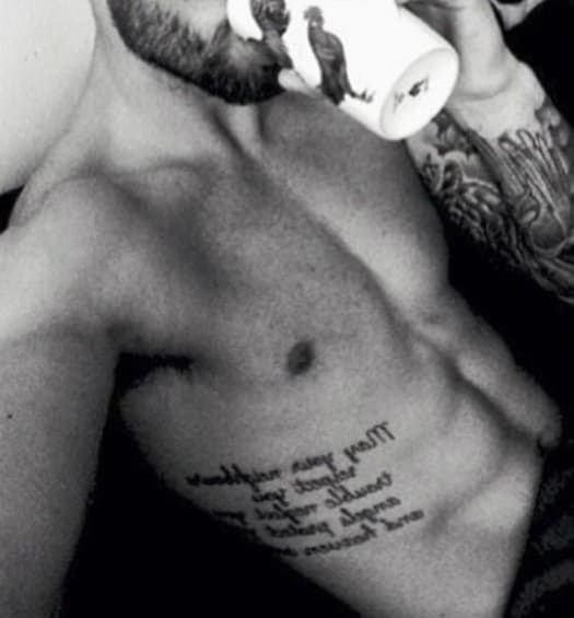 Rib quote tattoo