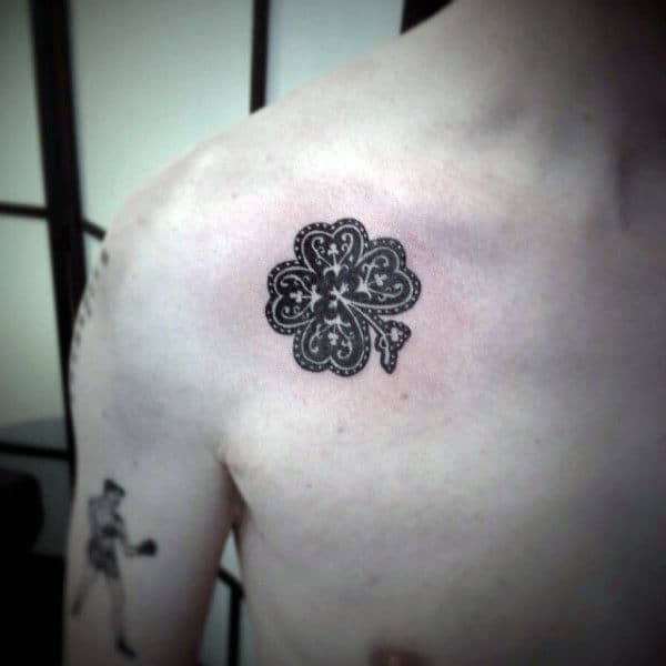 Mens Small Shamrock Tattoos On Chest With Black Ink