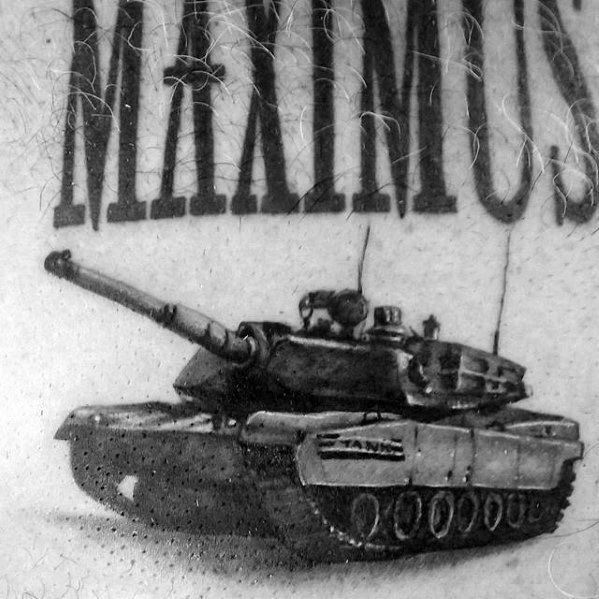 Detailed black and grey tattoo of a modern battle tank with the word “MAXIMUS” above, symbolizing strength and military power.