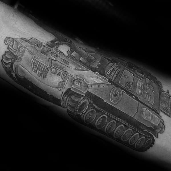 Black and grey forearm tattoo of a modern tank with realistic shading, detailed treads, and a bold three-quarter front perspective.