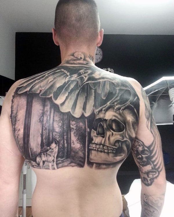Mens Tatto Of Owl Wolf And Skull On Upper Back
