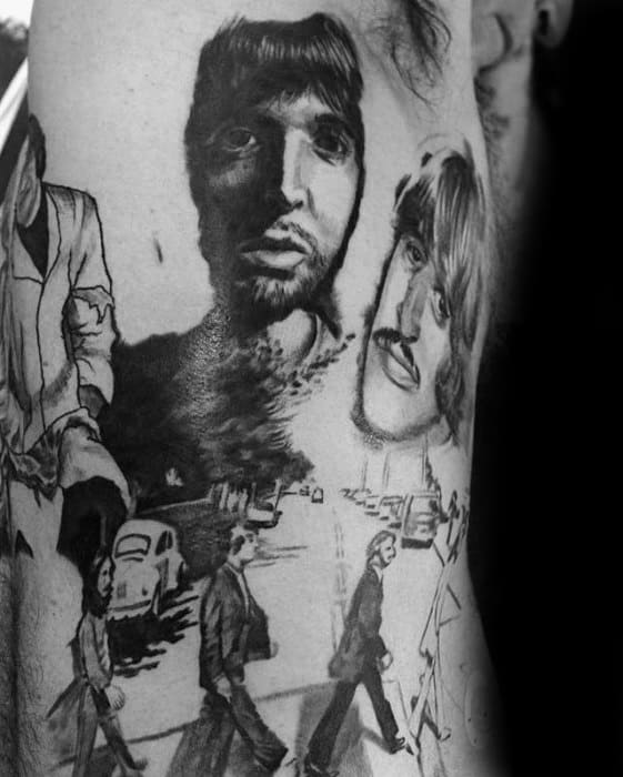 Black and gray tattoo collage of The Beatles featuring detailed portraits, Abbey Road crossing, and artistic sketch-style elements blending realism and linework.